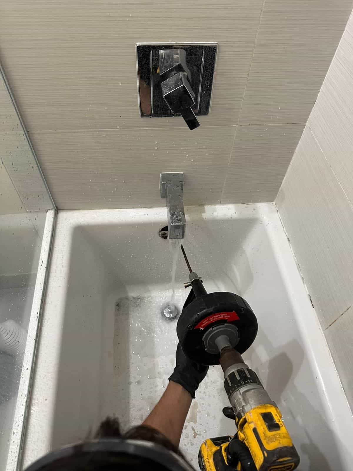 Before and after of a Drain cleaning by a plumber in Medley