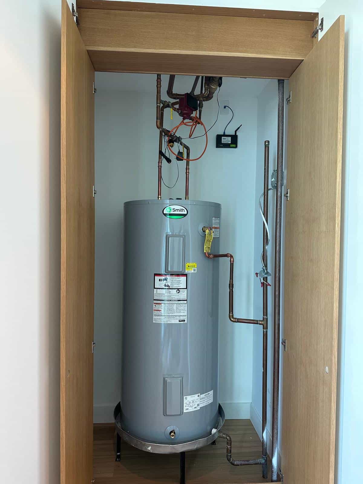 Before and after of a Water Heater by a plumber in Medley