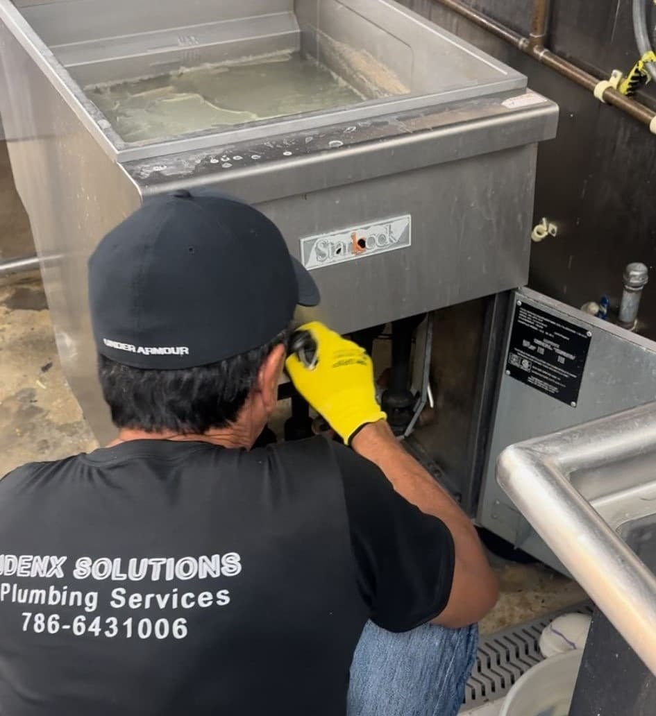 Plumber in Medley working on a project